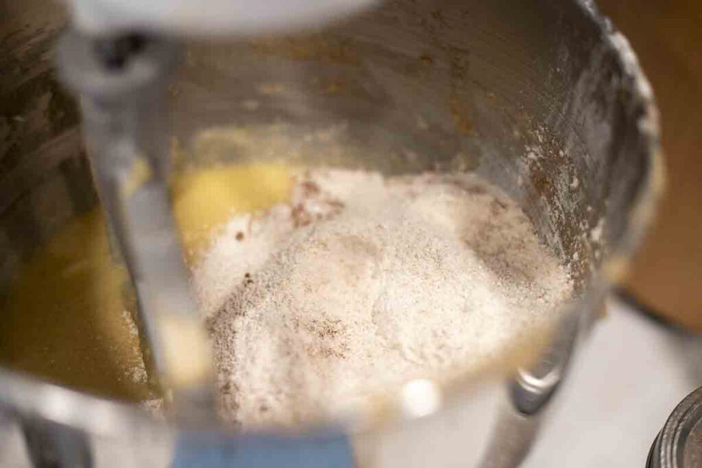 slowly adding flour and leaveners to wet ingredients.